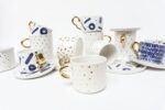 Ceramiczne filiżanki zdobione złotem, ręcznie robione, w kolorach kobaltowym i złotym